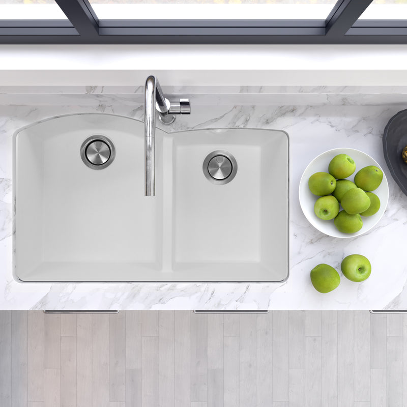 Nantucket Sinks PR6040-W-UM white double bowl sink undermounted in a marble counter, seen from above