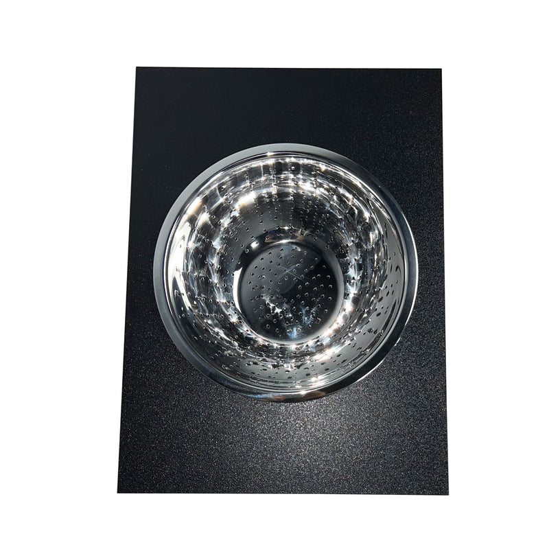 Nantucket Sinks PS20B-RD1 stainless colander set in the black board cutout, top view
