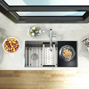 Nantucket Sinks PS20B-RD1 board with colander full of food on a prep station sink, top view