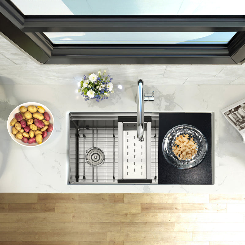 Nantucket Sinks PS20B-RD1 board with colander full of food on a prep station sink, top view