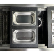 Nantucket Sinks PS20B-REC2 two-bin tray resting across the ledges of a stainless prep station sink