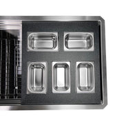 Nantucket Sinks PS20B-REC5 five-bin tray resting across the ledges of a stainless prep station sink