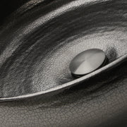 Nantucket Sinks RC72030P close-up of the crackled platinum leaf glaze around the drain cap