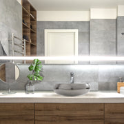 Nantucket Sinks RC72030P Monte Carlo platinum vessel sink on a wood vanity in a grey bathroom