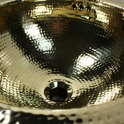 Nantucket Sinks ROB-OF close-up of the hammered brass basin, overflow holes and drain opening