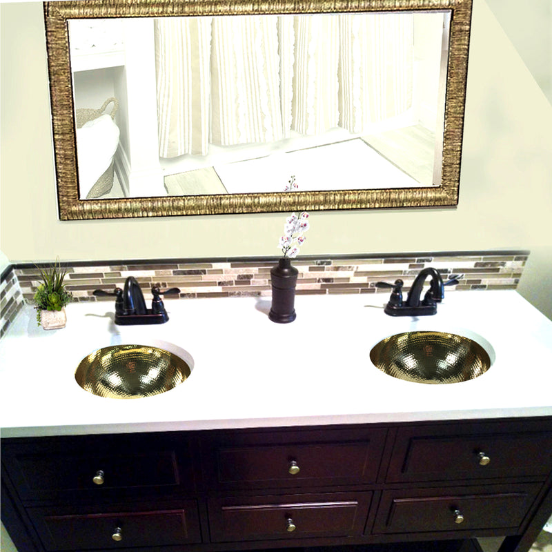 Nantucket Sinks ROB-OF two round brass sinks in a white top on a dark double vanity