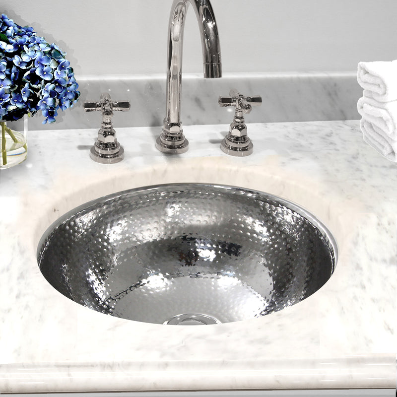 Nantucket Sinks ROS-OF installed in white marble with a cross-handle widespread faucet