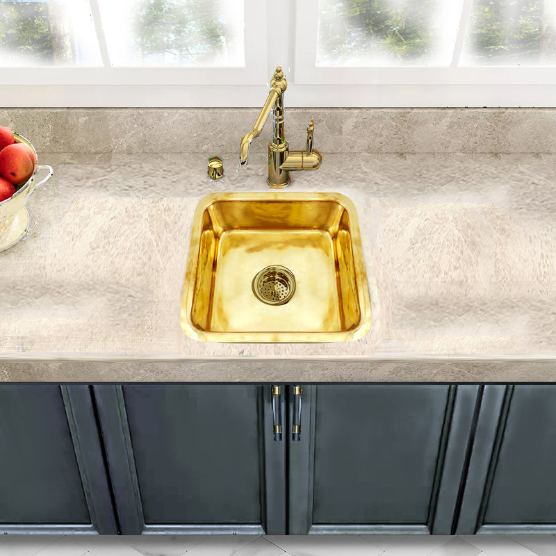 Nantucket Sinks SQRB-7SM smooth brass sink in a beige stone counter with a brass faucet, top view