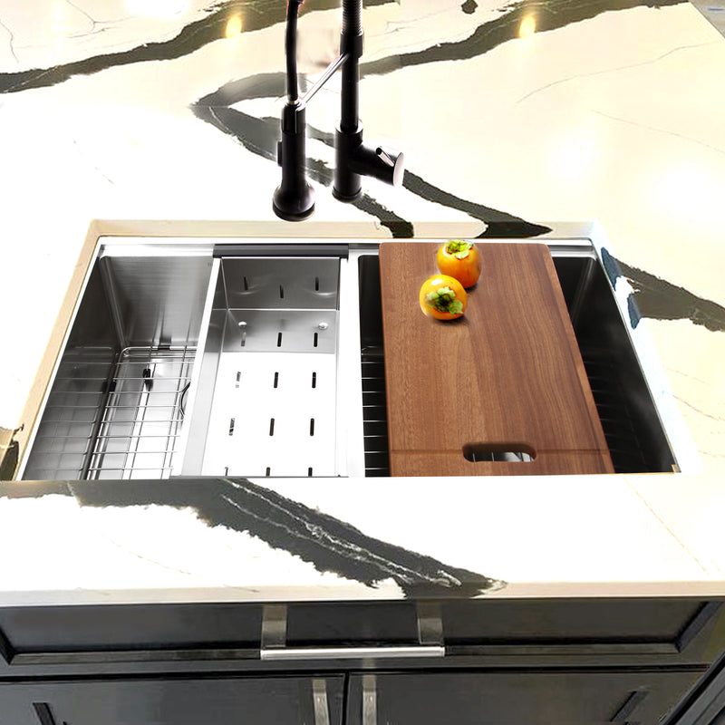 Nantucket Sinks SR-PS-3219-DE-16 installed in white marble with colander, board and black faucet
