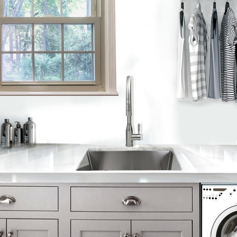 Nantucket Sinks SR2318-12-16 installed in a gray laundry room under a window