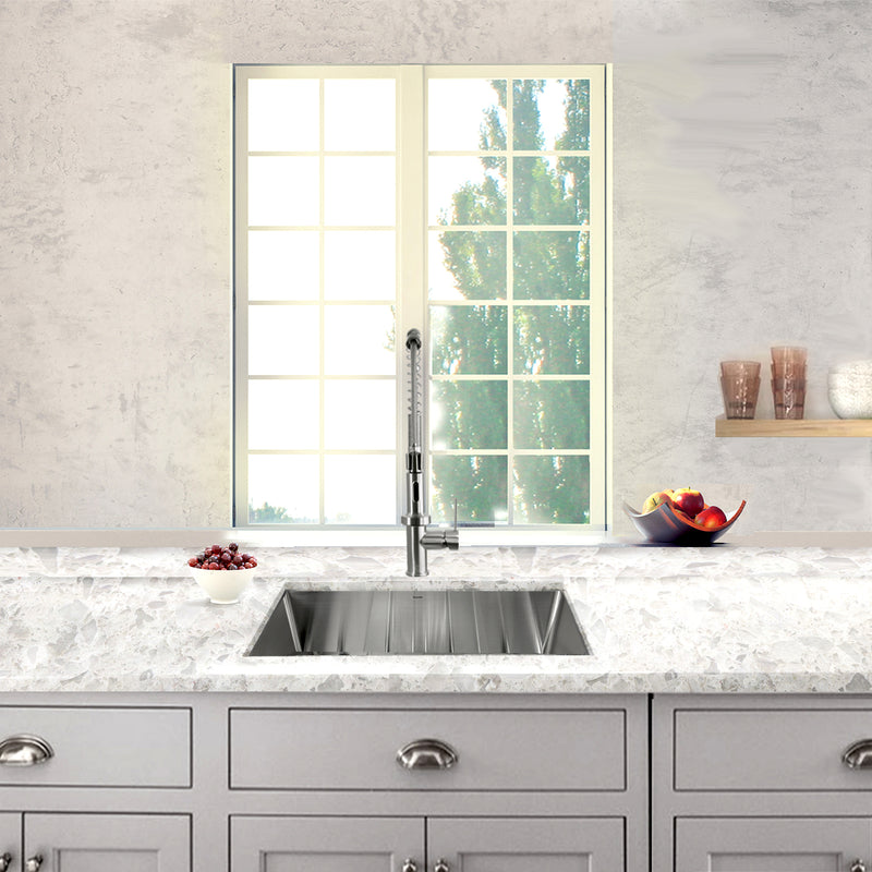 Nantucket Sinks SR2318-16 installed in a gray quartz counter under a window