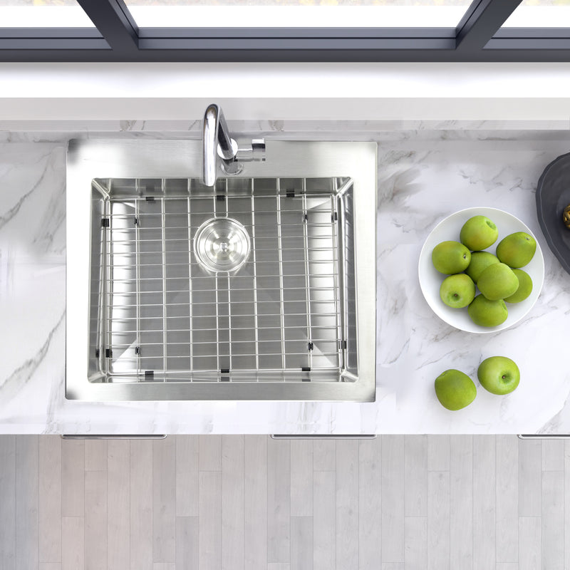 Nantucket Sinks SR2522-5.5-16 overhead view installed in white marble with grid and faucet