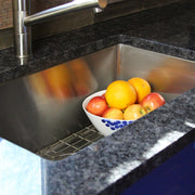 Nantucket Sinks SR3018 close view in dark granite with a fruit bowl on the grid