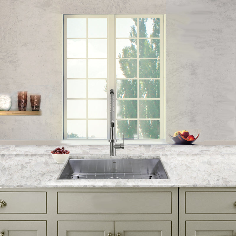 Nantucket Sinks SS-PRO-ZR3018-5.5 installed in a light quartz counter under a window