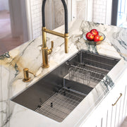 Nantucket Sinks STEPPE3918 installed in a gold-veined marble counter with the rinse basket