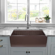 Nantucket Sinks T-FCFS30CB Coffee Brown farmhouse sink below a window with grey stone counters