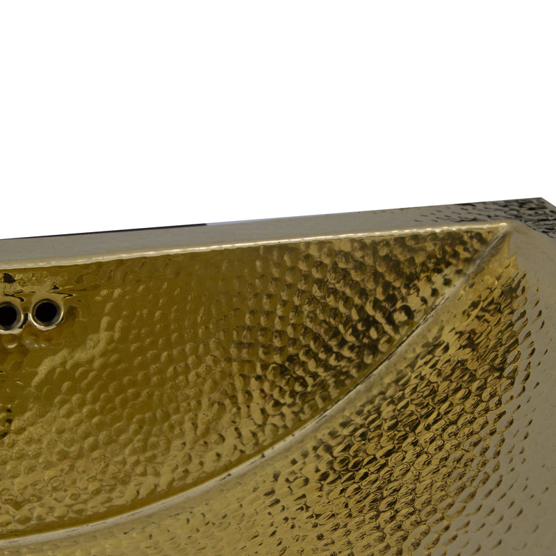 Nantucket Sinks TRB2416-OF close-up of the hammered brass basin wall and overflow holes