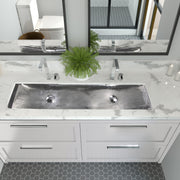 Nantucket Sinks TRS48-OF stainless trough sink with two faucets in a white marble double vanity
