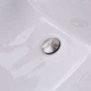 Nantucket Sinks UM-18x13-W close-up of the brushed drain in the white glazed bowl