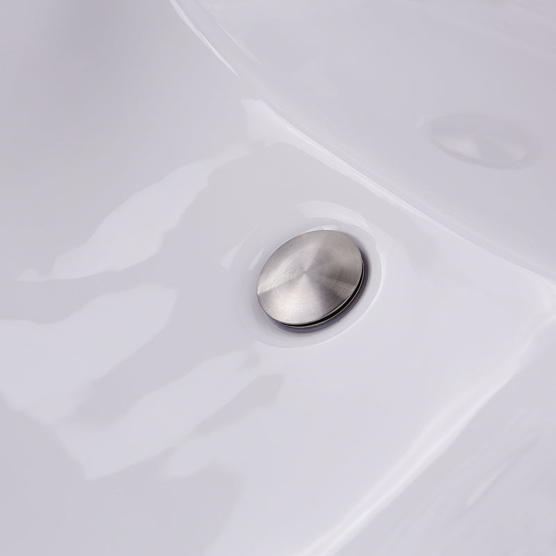Nantucket Sinks UM-18x13-W close-up of the brushed drain in the white glazed bowl
