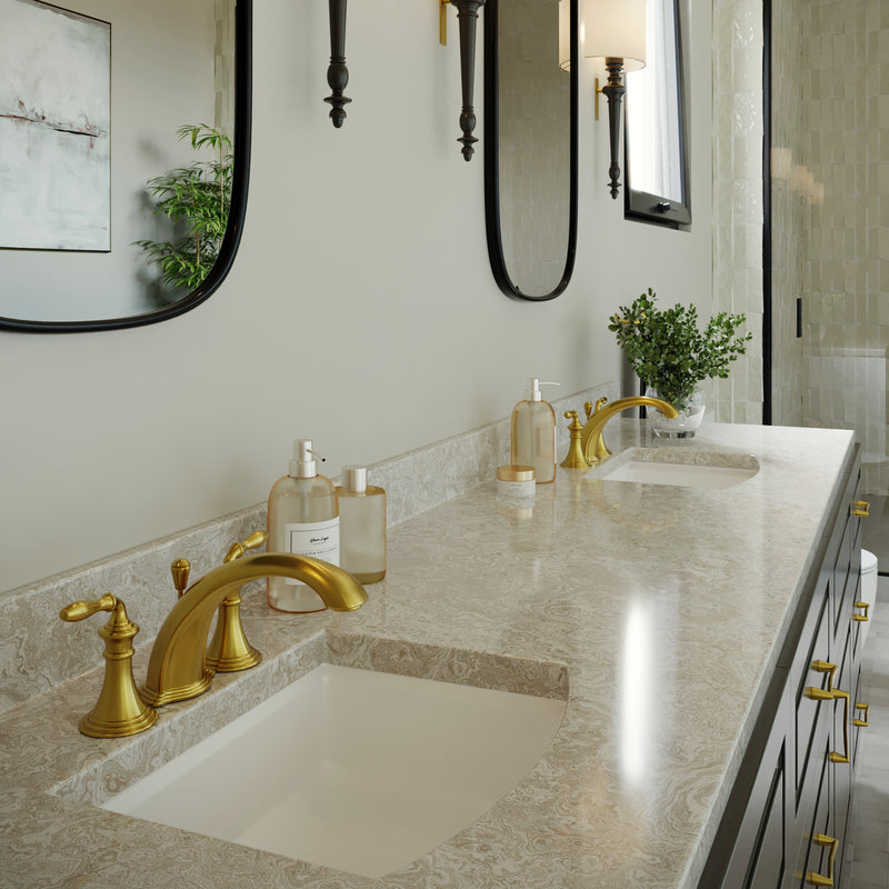 Nantucket Sinks UM-2016C-W white undermount sinks in a stone double vanity with gold faucets