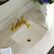 Nantucket Sinks UM-2016C-W white arched-front undermount sink in a stone vanity with a gold widespread faucet