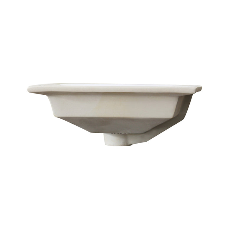 Nantucket Sinks UM-2016C-W side profile of the arched-front undermount bowl and drain outlet