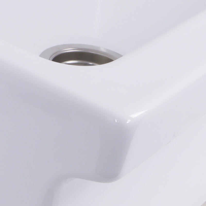 Nantucket Sinks Yarmouth-36W close-up of the glossy white bowl corner around the drain