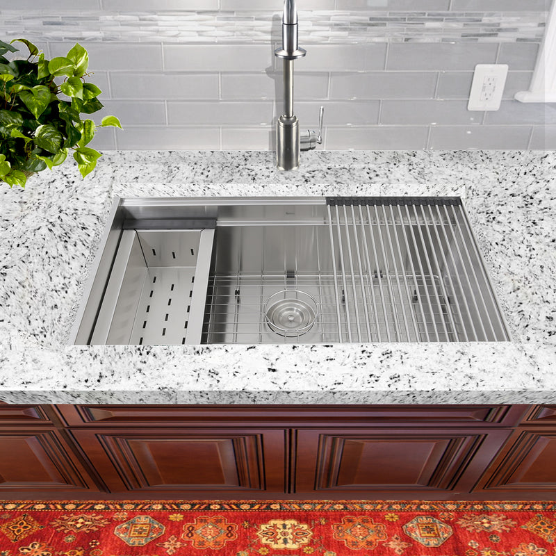Nantucket Sinks ZR-PS-3220-16 installed in white granite with colander and rolling mat