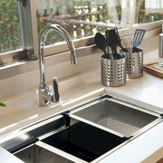 Nantucket Sinks ZR-PS-3620-16 installed in a white counter with the rinse tray by a window