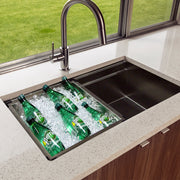 Nantucket Sinks ZR-PS-3620-16 rinse tray filled with ice and bottles in a quartz counter