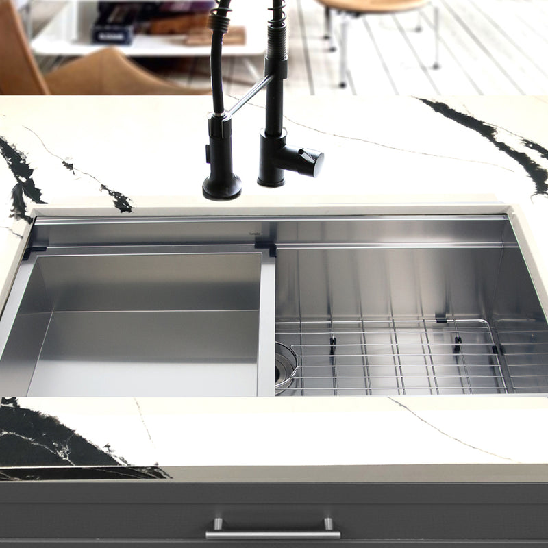 Nantucket Sinks ZR-PS-3620-16 installed in black-veined marble with the rinse tray and grid