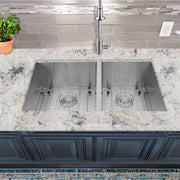 Nantucket Sinks ZR3219-OS-16 installed in light granite with grids under a pull-down faucet