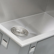 Nantucket Sinks ZR3322-S-16 close-up of the colander drain and zero radius corner