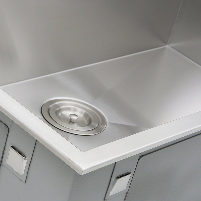 Nantucket Sinks ZR3322-S-16 close-up of the colander drain and zero radius corner