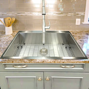Nantucket Sinks ZR3322-S-16 installed in granite with the grid and a pull-down faucet