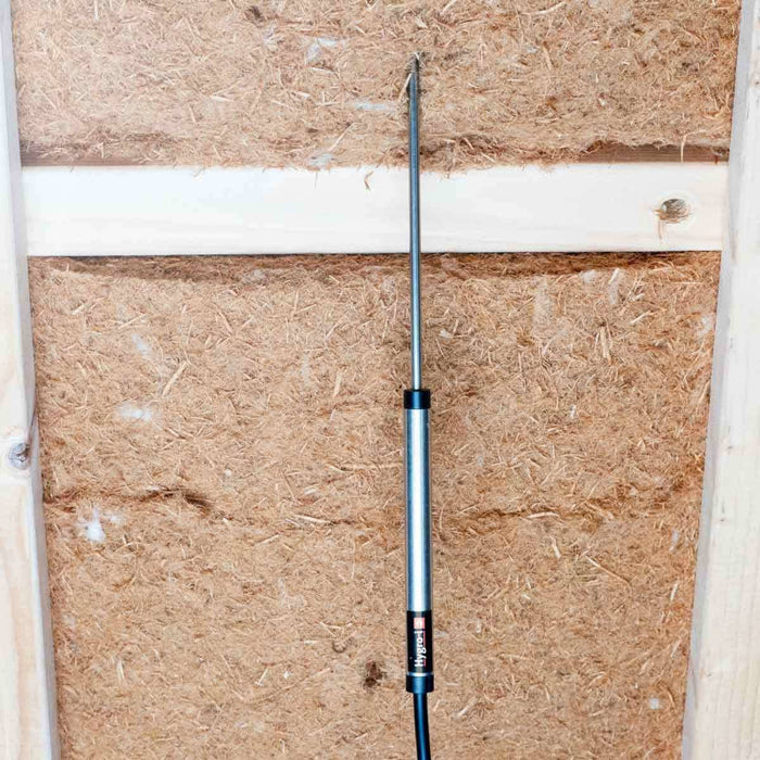 Tramex 10" Narrow RH Probe - RHP-NW-B A narrow probe designed for measuring relative humidity within materials, displayed with a focus on its compatibility with woodfibre insulation.
