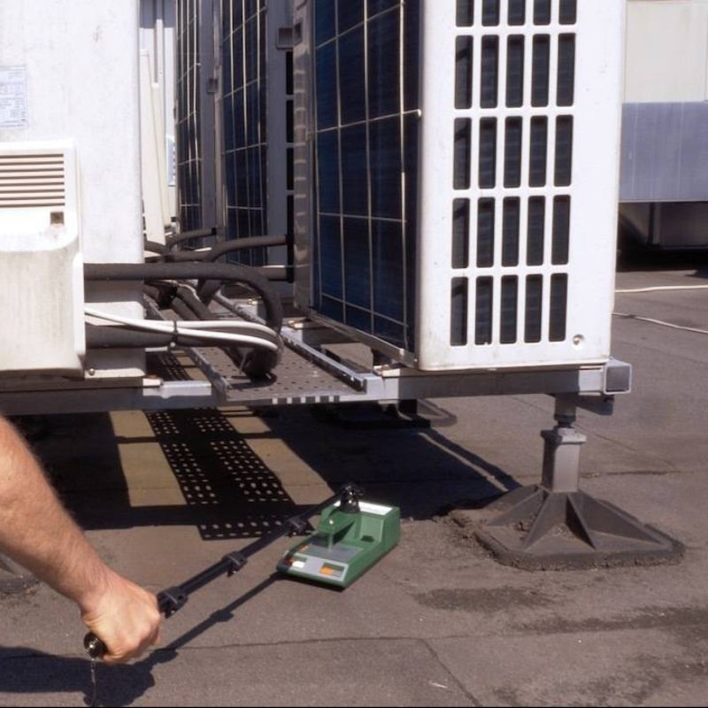 Tramex Roofing Inspector Kit - RIK A detailed image of the Tramex Roofing Inspector Kit, featuring the RIK device equipped with an extension arm, designed for effective moisture testing on roofs, showcasing its sleek design and measurement features.