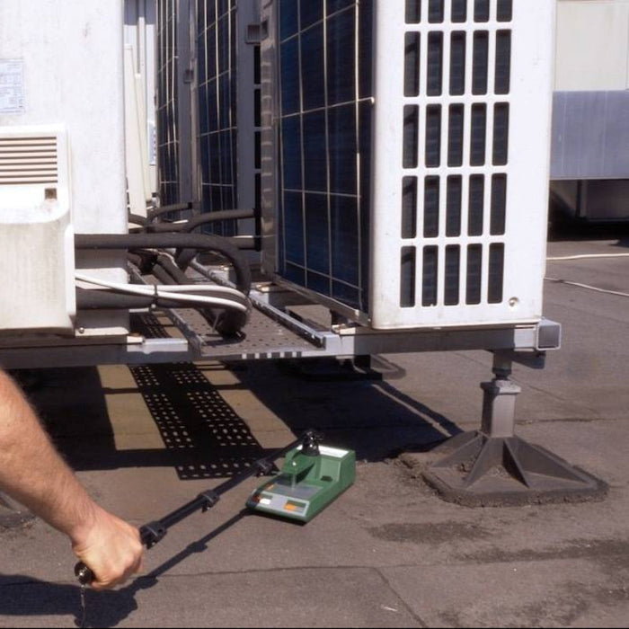 Tramex Roofing Inspector Kit - RIK A detailed image of the Tramex Roofing Inspector Kit, featuring the RIK device equipped with an extension arm, designed for effective moisture testing on roofs, showcasing its sleek design and measurement features.