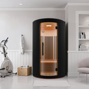 SaunaSpa SC-SS0025-0SBK infrared sauna in black in a home setting