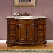 Silkroad Exclusive HYP-0277-CM-UWC-48 48" Brazilian Rosewood vanity with Crema Marfil top, front view in a bathroom