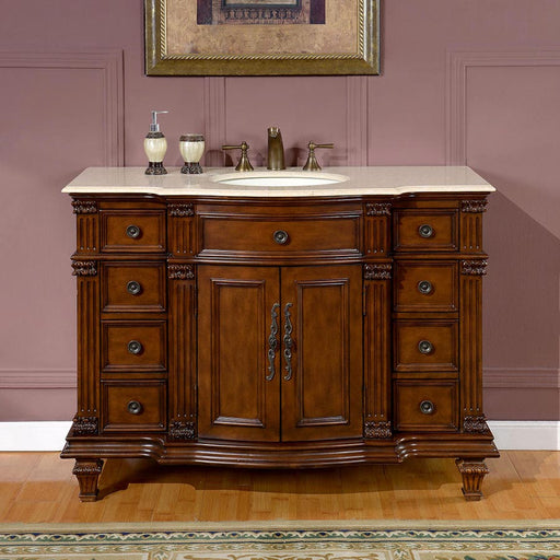 Silkroad Exclusive HYP-0277-CM-UWC-48 48" Brazilian Rosewood vanity with Crema Marfil top, front view in a bathroom