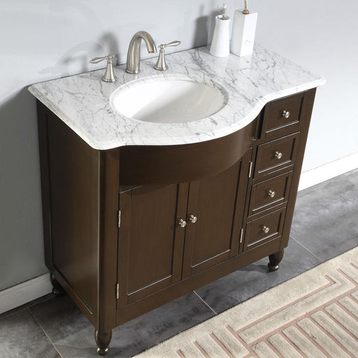 Silkroad Exclusive HYP-0902-WM-UWC-38-L high angle of the Carrara White marble top and white oval sink set to the left