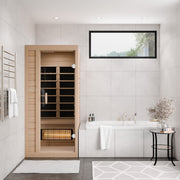 SteamSpa SC-SS0013-GS infrared sauna in a white bathroom beside the tub