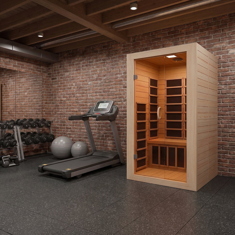 SteamSpa SC-SS0014-GS infrared sauna in a brick-wall home gym