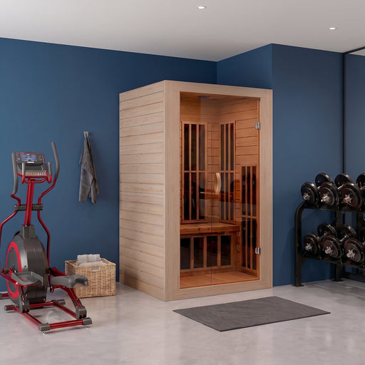SteamSpa SC-SS0014-GS infrared sauna in a home gym with a blue wall