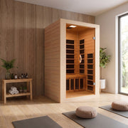 SteamSpa SC-SS0014-GS infrared sauna in a room with a wood slat wall
