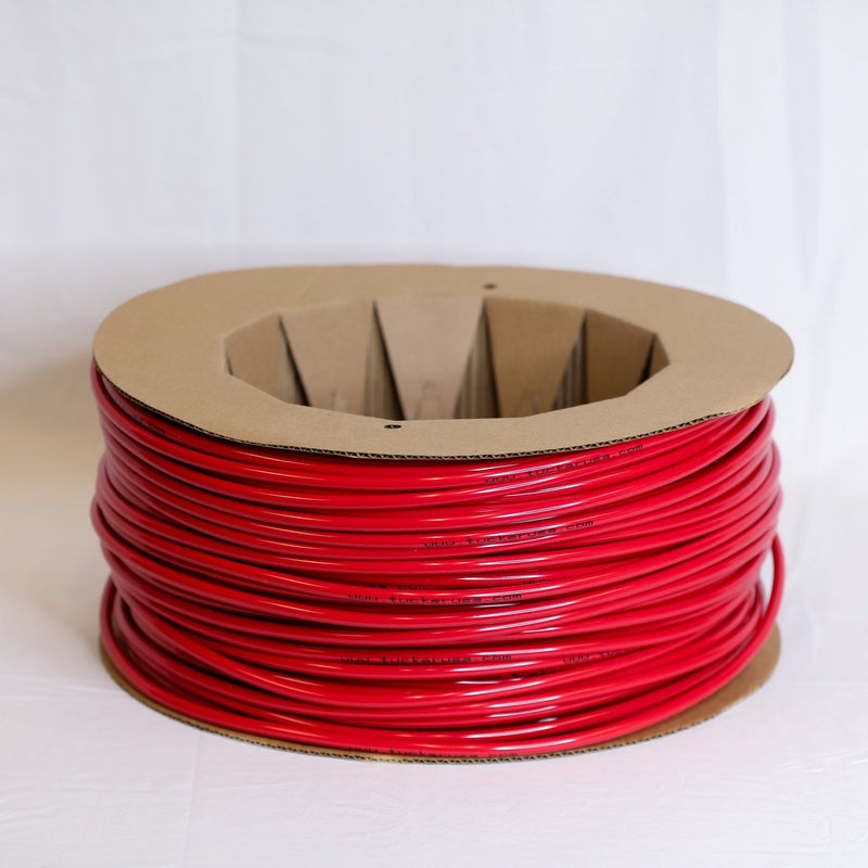 Tucker red 5/16 OD pole hose on cardboard spool