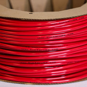 Tucker red pole hose close up with tuckerusa.com print