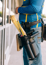 Tucker BOAB by Takaki Works on a window cleaner belt holding a squeegee and strip washer